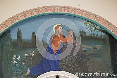 Painting of Jesus praying in St. Elizabeth Catholic Church, Eureka Springs, Arkansas Editorial Stock Photo