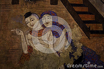 Painting of men and women hugging each other of Wat Phumin. Stock Photo