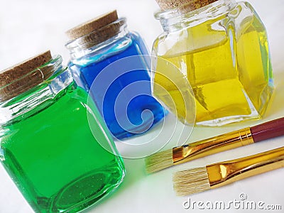 Paints and paint brushes Stock Photo