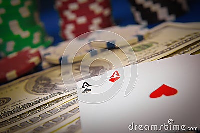 Pair of aces and poker chips on black background Stock Photo