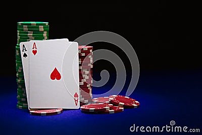 Pair of aces on stuck of chips Stock Photo