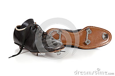 Pair of baseball cleats on white Stock Photo