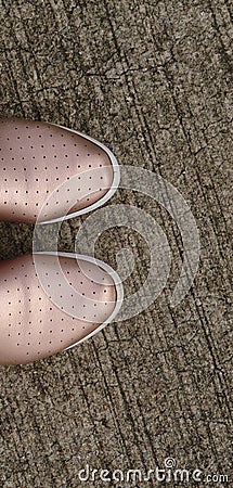 A pair of beautiful shoes stapping on cement floor Stock Photo