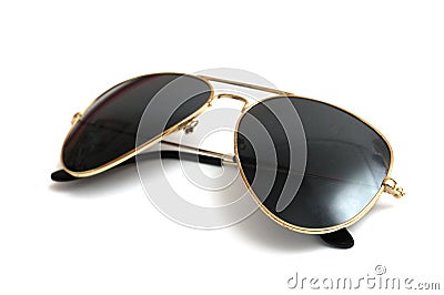 A pair of black aviator sun shade spectacles glasses against a white backdrop Stock Photo