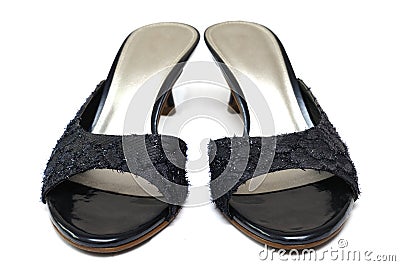 A pair of black ladies high-heeled shoes with vamps and bare back quarter Stock Photo