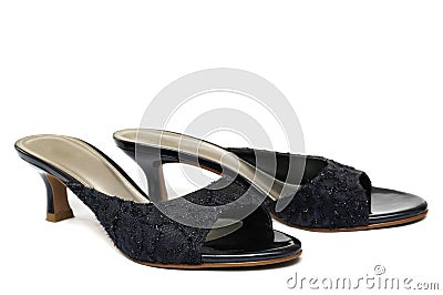 A pair of black ladies high-heeled shoes with vamps and bare back quarter Stock Photo