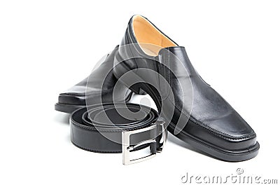 Pair black man's shoe and a belt Stock Photo