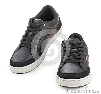 Pair of black mens sport shoes, sneakers isolated on a white background Stock Photo