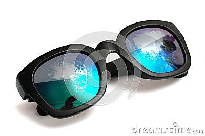 A pair of black sun shade spectacles glasses against a white backdrop Stock Photo