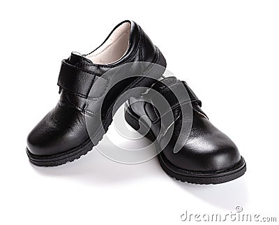 Pair of brand new black leather shoe for children on white Stock Photo