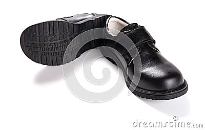 Pair of brand new black leather shoe for children on white Stock Photo