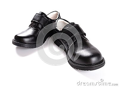 Pair of brand new black leather shoe for children on white Stock Photo