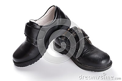 Pair of brand new black leather shoe for children on white Stock Photo