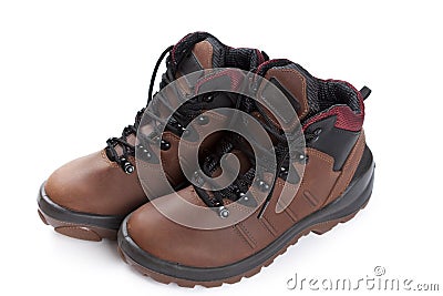 Pair of brown working boots on white Stock Photo