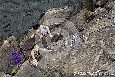 Pair of climbers starts an ascent Stock Photo