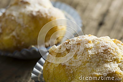 Pair of cream puffs filled with cream Stock Photo