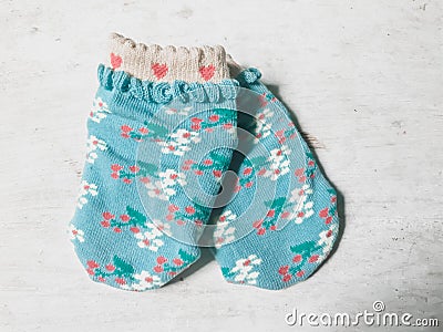 Shabby chic baby socks Stock Photo