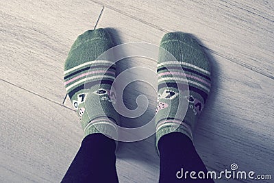 A pair of feet in socks. Stock Photo