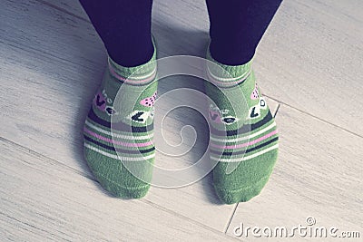A pair of feet in socks. Stock Photo