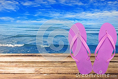 Pair Of Flip-flops Against Sea Stock Photo