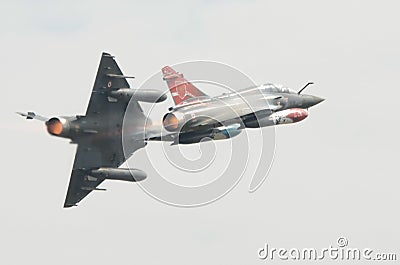 A pair of French Air Force Mirage 2000 display team break away Editorial Stock Photo