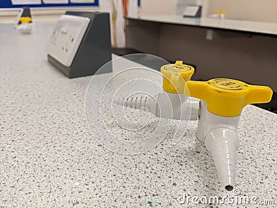 A pair of gas taps on a laboratory work bench Stock Photo