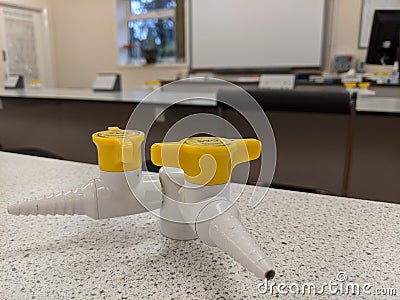 A close up of a pair of gas taps on a laboratory work bench Stock Photo