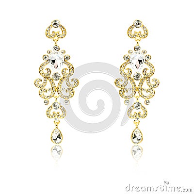 Pair of golden diamond earrings isolated on white Stock Photo