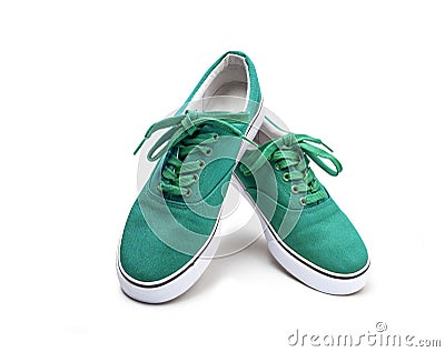 A pair of green canvas shoes isolated on white Stock Photo