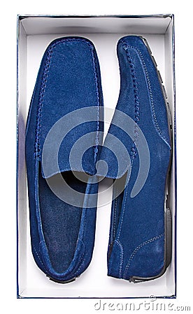 Pair of male blue moccasins in box Stock Photo