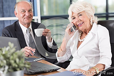 Pair of mature entrepreneurs Stock Photo