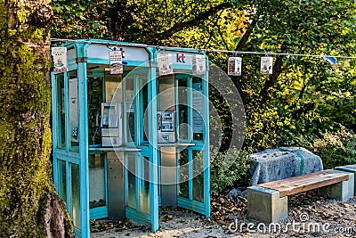 Pair of old fashioned pay phones Editorial Stock Photo