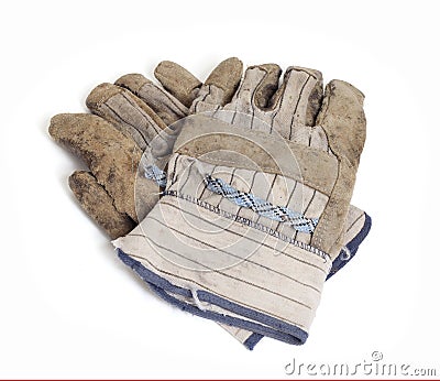 A Pair of Old, Heavily Worn Work Gloves Isolated on White Stock Photo