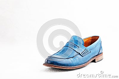 Pair of old leather blue discarded boots with laces Stock Photo