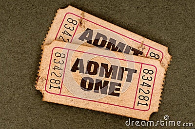 Pair of old torn admit one movie tickets Stock Photo