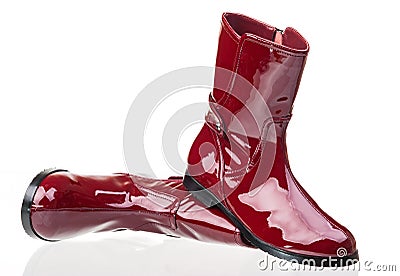 Pair of red patent leather female boots Stock Photo