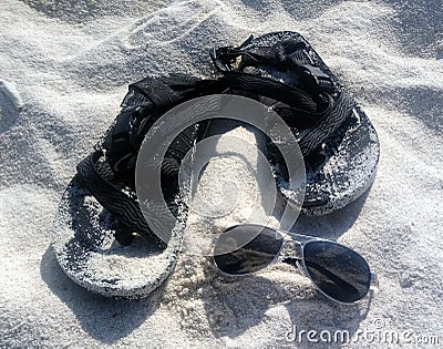 Sand. Sandals. Shades. Stock Photo