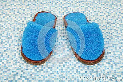 Pair of soft blue slippers Stock Photo