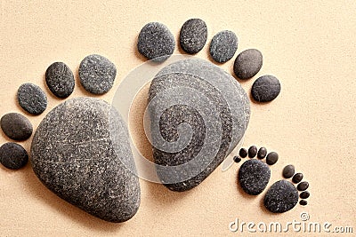 Pair of stones in the shape of human feet Stock Photo