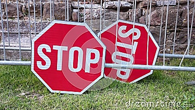 A pair of stop signs Stock Photo