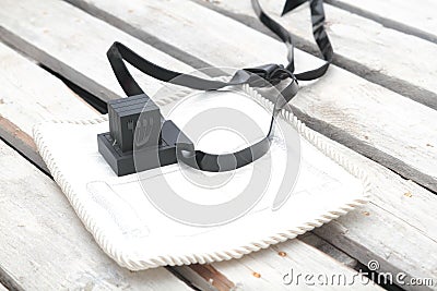 Pair of tefilin and Tallit A symbol of the Jewish people, a pair of tefillin with black straps, isolated on a white background, wi Stock Photo