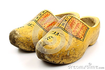 Pair of traditional Dutch yellow wooden shoes Stock Photo