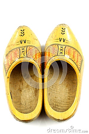 Pair of traditional Dutch yellow wooden shoes Stock Photo