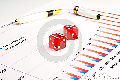 A pair of transparent dice on financial chart Stock Photo