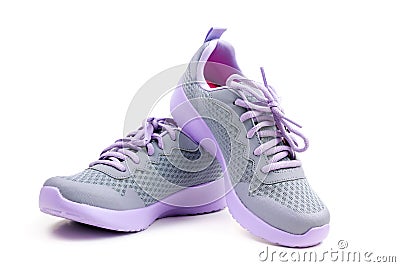 Unbranded purple running shoes on a white background Stock Photo