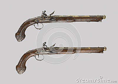 Pair of vintage pistols on a white background Stock Photo