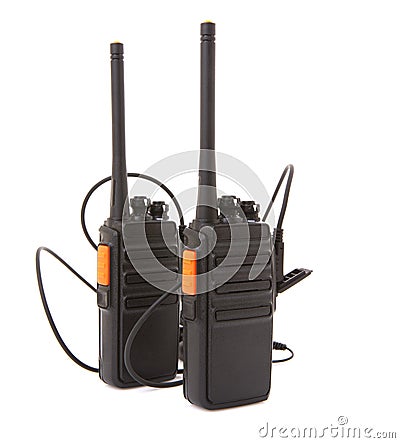 Pair of Walkie Talkie 2 way radios with headsets Stock Photo