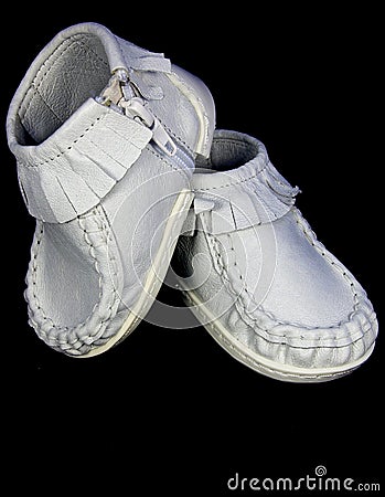 Pair white children's shoes Stock Photo