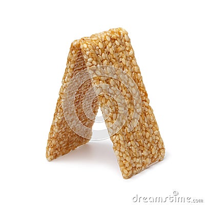 Pair of white sesame snaps on white background close up Stock Photo