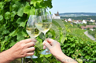 Pair of wineglasses against vineyards Stock Photo